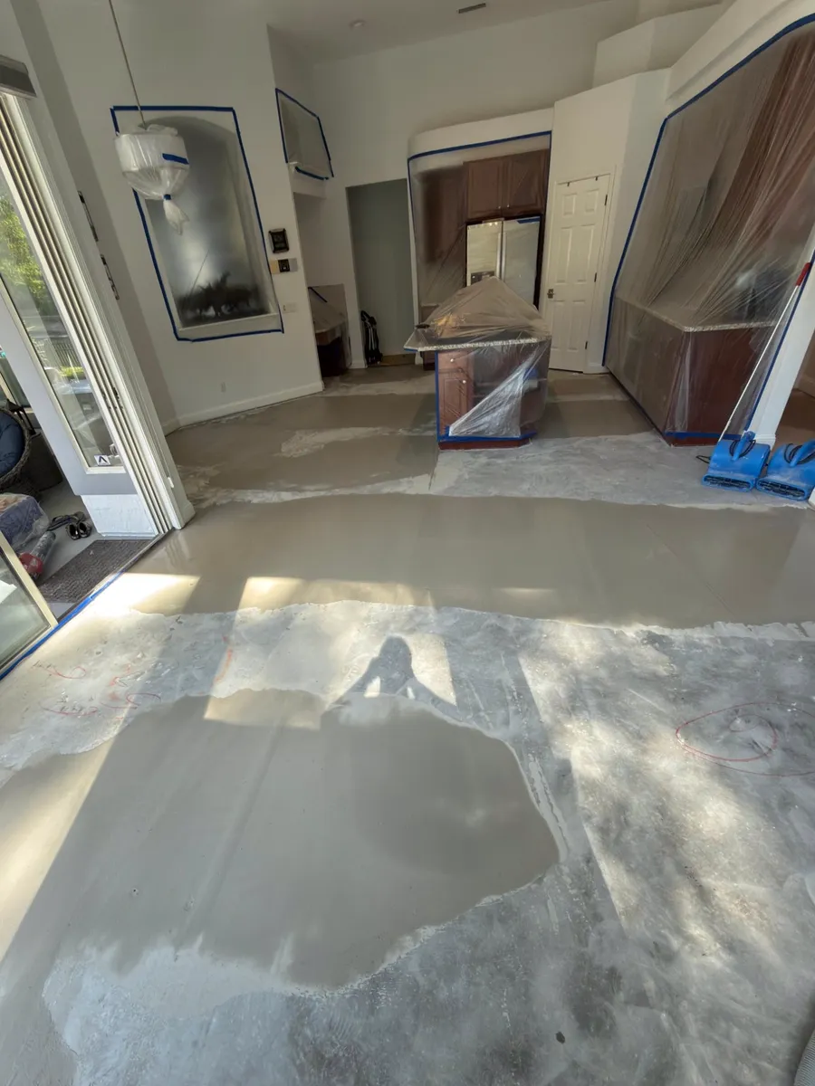 Concrete slab with self-leveling compound poured before hardwood installation in Fernandina Beach, FL