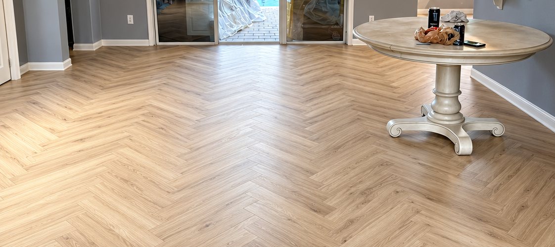 Herringbone laminate flooring installation in Jacksonville, FL by Nunes 4 Flooring