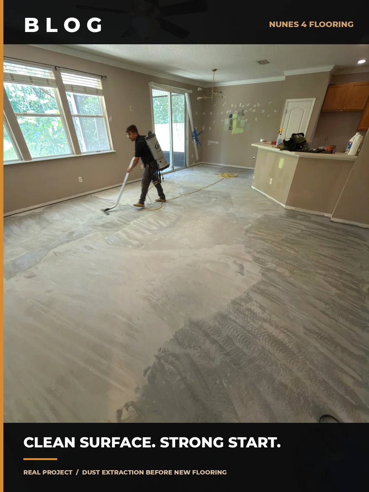 Nunes 4 Flooring team vacuuming a large concrete subfloor before flooring installation