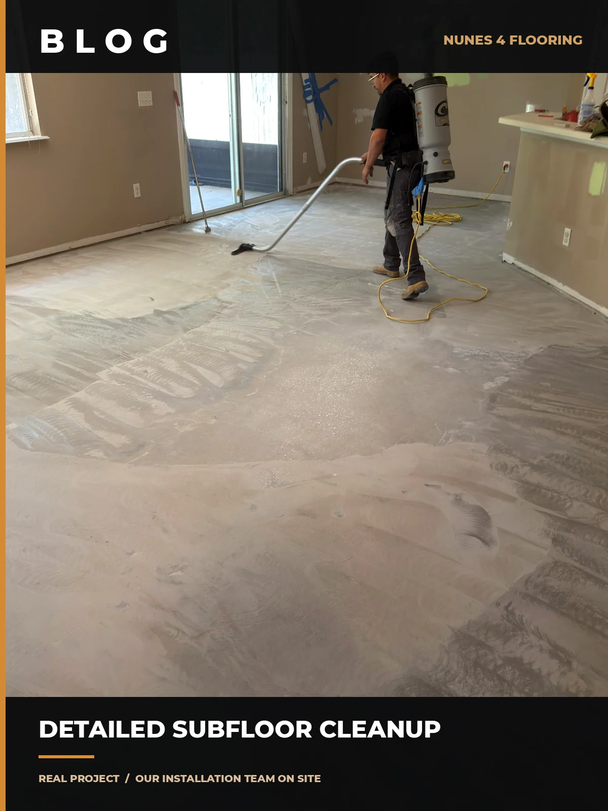 Nunes 4 Flooring worker cleaning the concrete subfloor with an industrial vacuum