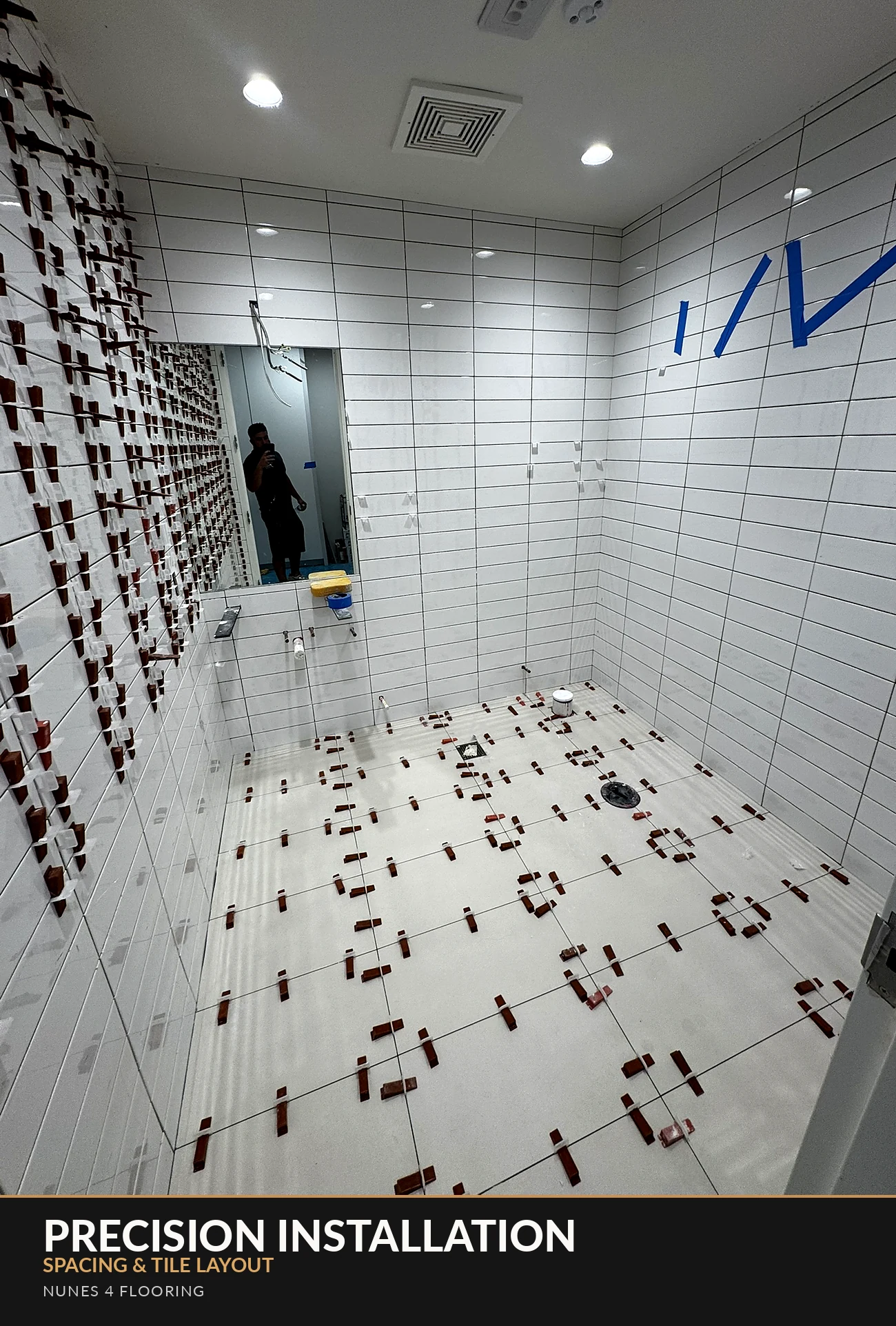 Nunes 4 Flooring white tile installation with leveling spacers
